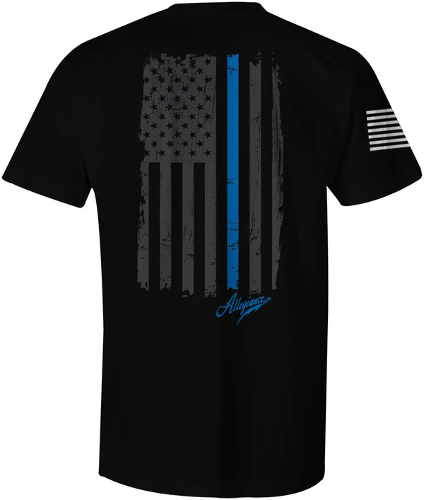 Back of Back the Blue Back Hit Tee in black showcasing large grayscale American flag with a bold blue line and Allegiance logo.