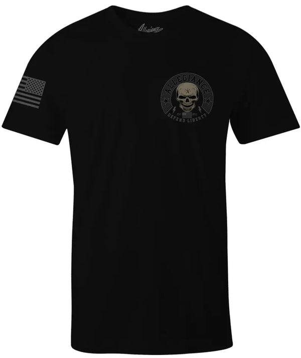Front of Defender Tee in black with small chest graphic and American flag printed on the sleeve