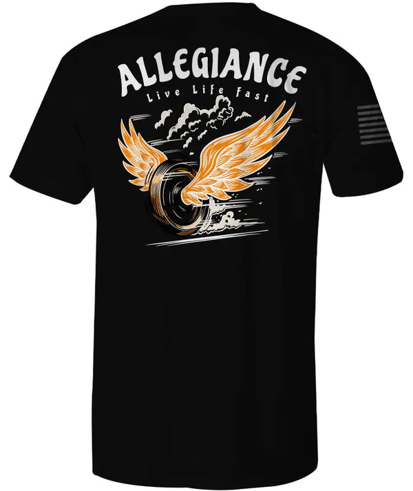Black Wheelin' Tee featuring large flaming tire burnout graphic with bold wings and 'Live Life Fast' text.